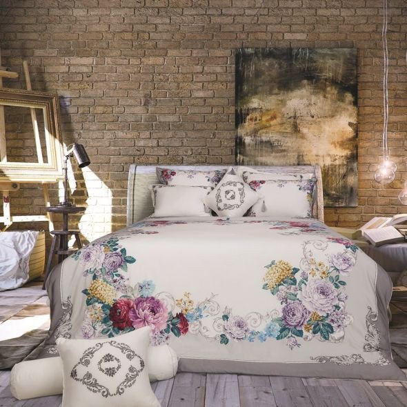 Một bộ ga chun chần màu trắng tinh khôi với họa tiết thanh lịch, lý tưởng cho người tuổi Ất Mùi và Đinh Mùi