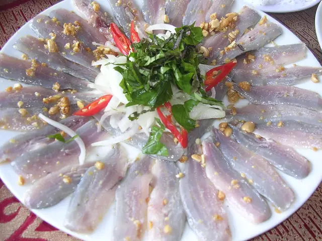 Mơ Thấy Ăn Gỏi Cá