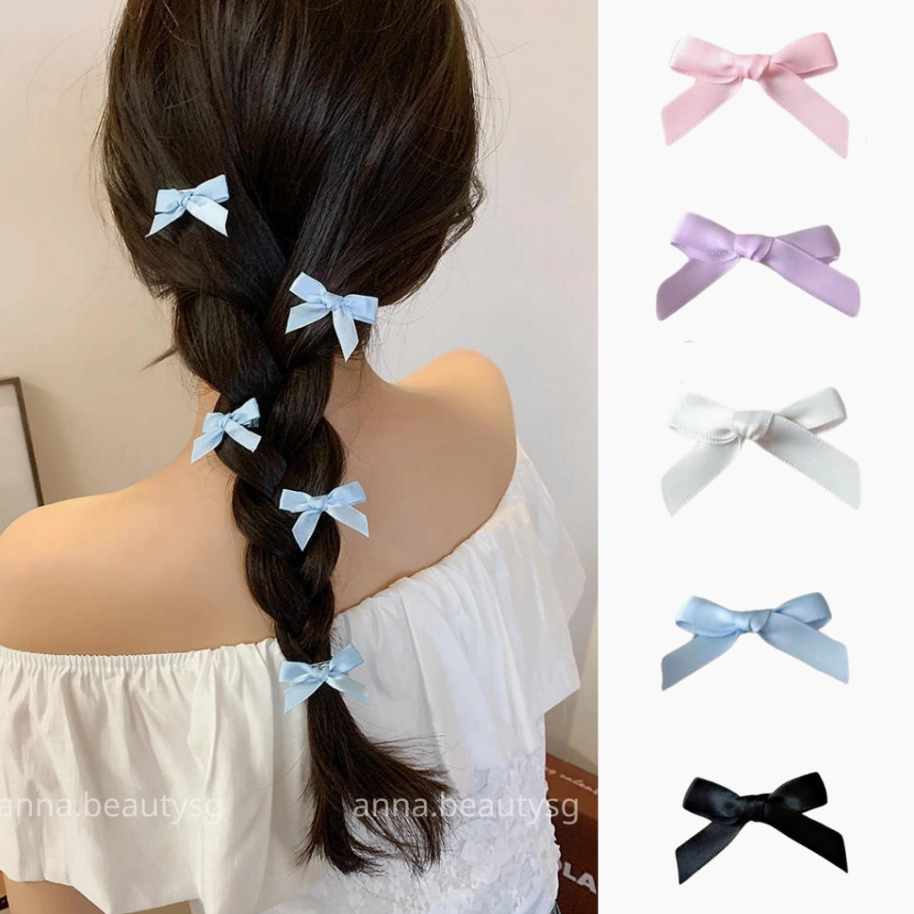 Kẹp tóc nơ phối cùng kiểu tóc tết duyên dáng